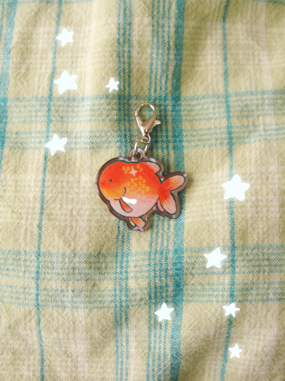 nhi's first goldfish charm