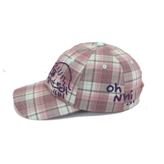 winking mauve plaid cap